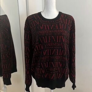 Valentino Black and Red Crewneck Sweater with Bold Pattern